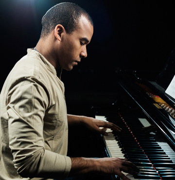 Adult student at the piano in NTPPA's adult program