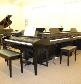 Adult group piano class in the Clavinova Piano Lab