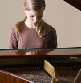 Student playing piano in the NTPPA core program
